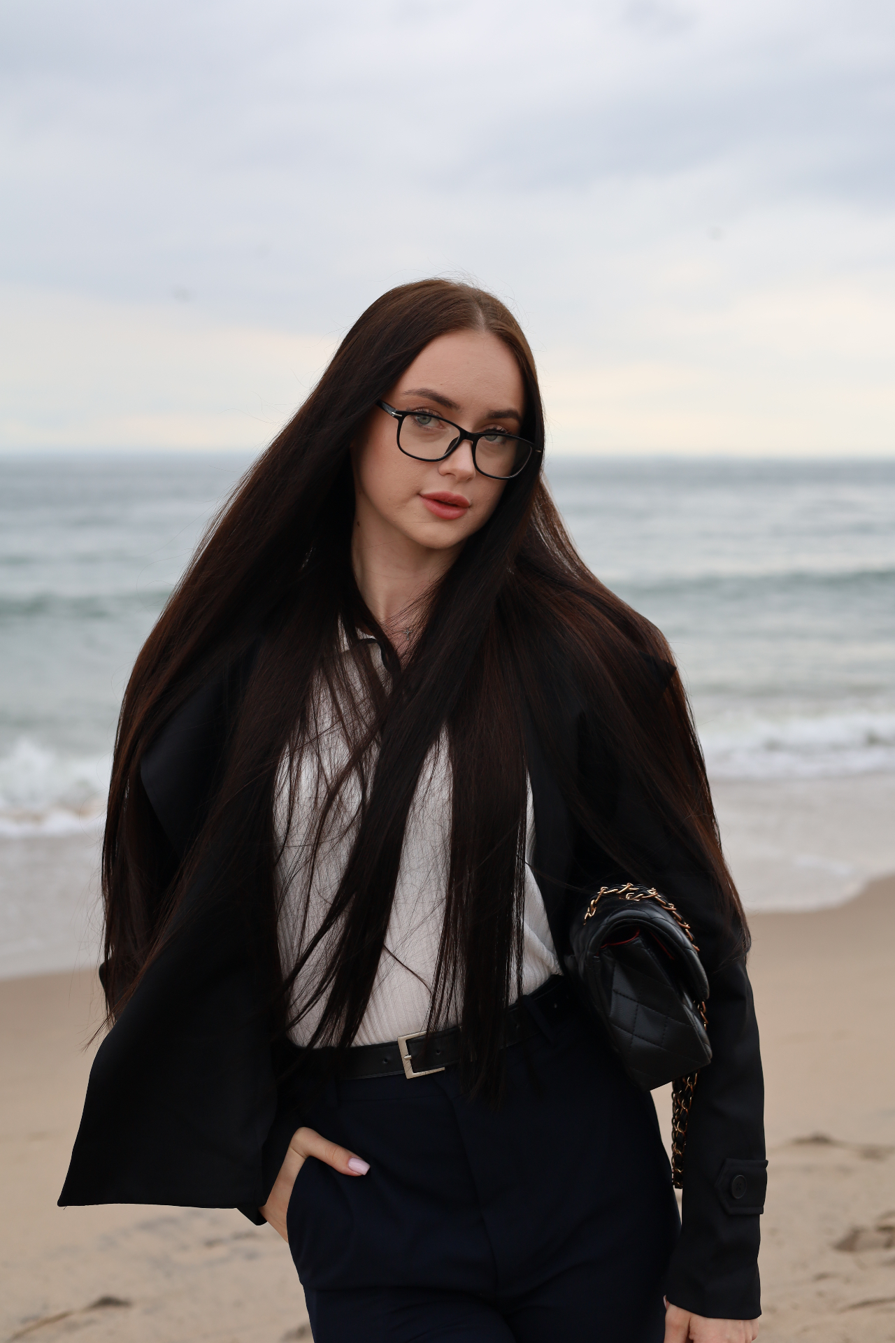 Long-hair beach portrait with glasses