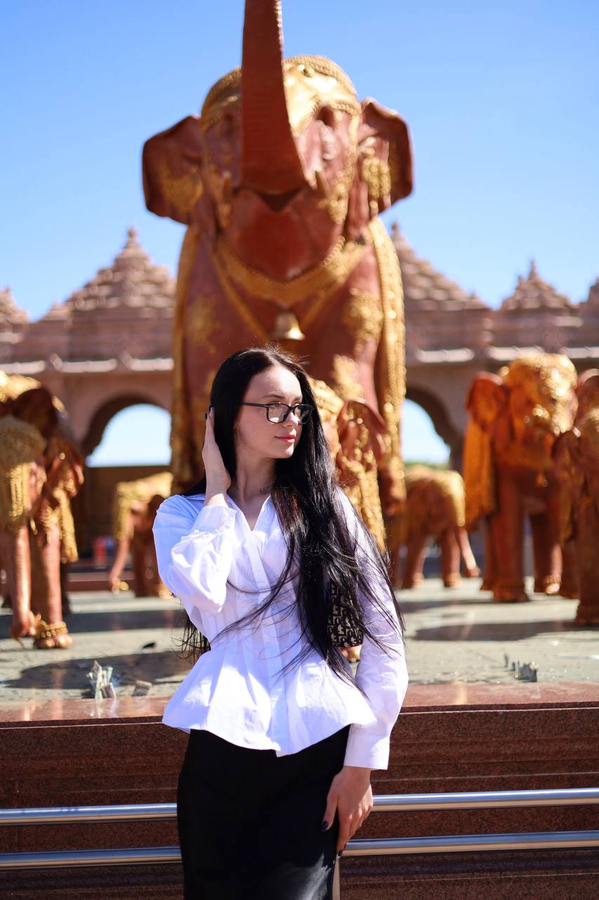 White shirt portrait with golden elephants